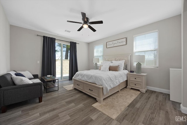 5503 Giverny Way, Bakersfield, CA 93306 - bedroom with light wood-style flooring, access to exterior, baseboards, and a ceiling fan