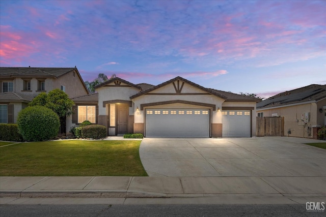 12415 Childress St, Bakersfield, CA 93312 - view of front of home with stucco siding, an attached garage, concrete driveway, and a tile roof