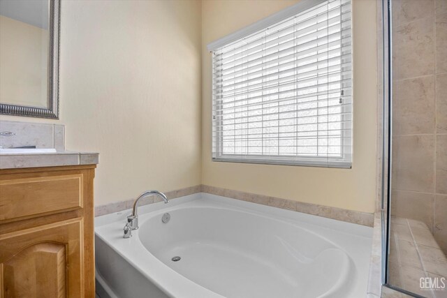 12415 Childress St, Bakersfield, CA 93312 - full bath featuring a bath and vanity
