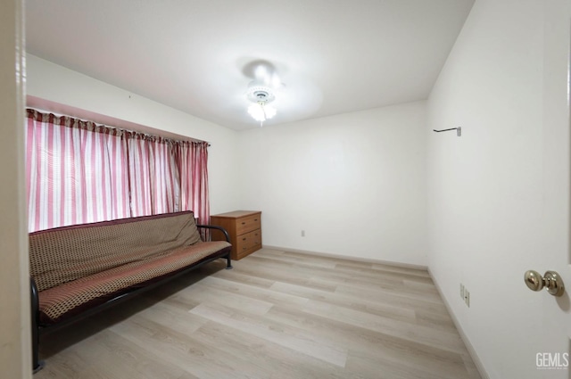 sitting room featuring light hardwood / wood-style floors