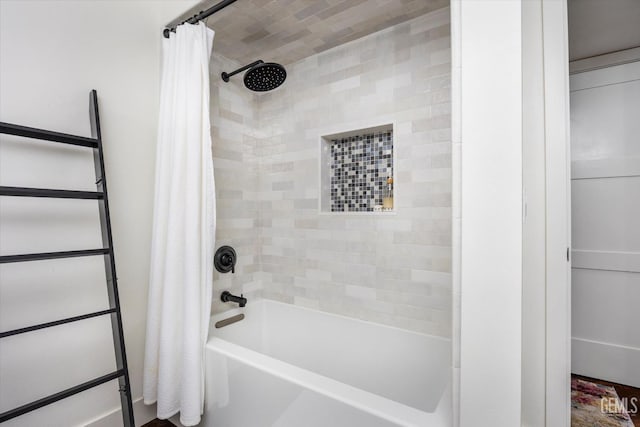 bathroom featuring shower / bath combo with shower curtain