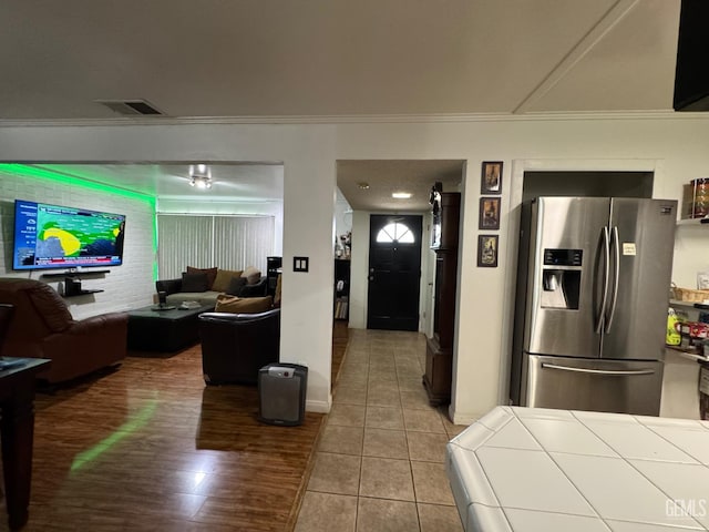 6301 Scenic Way, Bakersfield, CA 93309 - living room with ornamental molding and tile patterned flooring