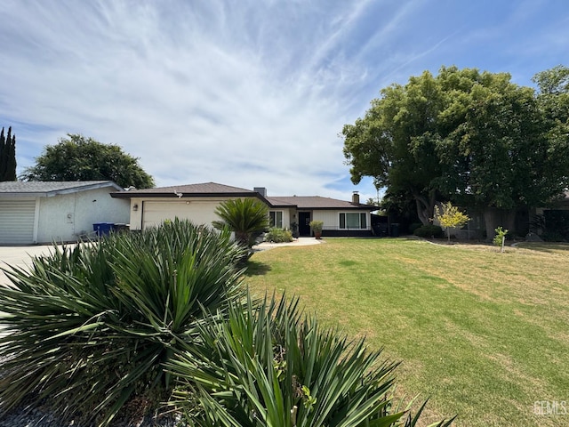 6301 Scenic Way, Bakersfield, CA 93309 - view of green lawn with an attached garage
