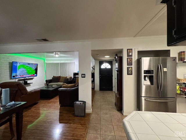 6301 Scenic Way, Bakersfield, CA 93309 - living room featuring ornamental molding and tile patterned floors