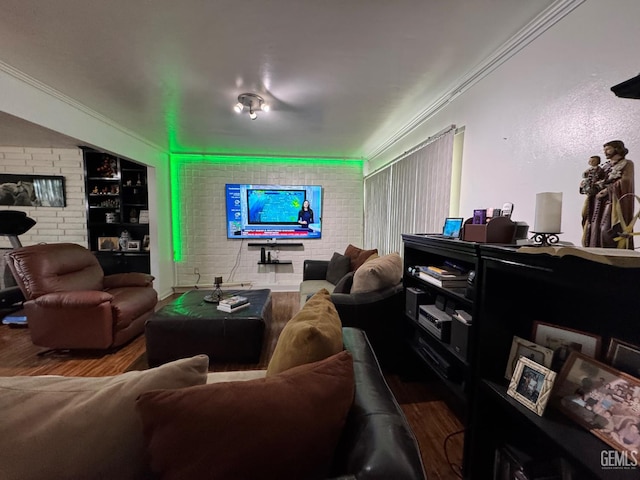 6301 Scenic Way, Bakersfield, CA 93309 - living room featuring wood finished floors, brick wall, built in shelves, and ornamental molding