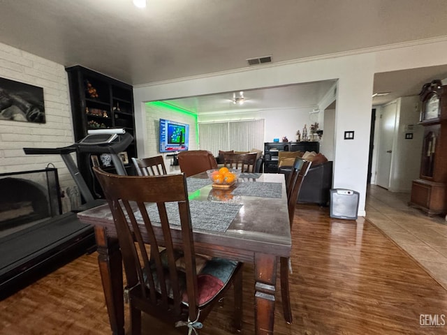 6301 Scenic Way, Bakersfield, CA 93309 - dining area with wood finished floors and ornamental molding