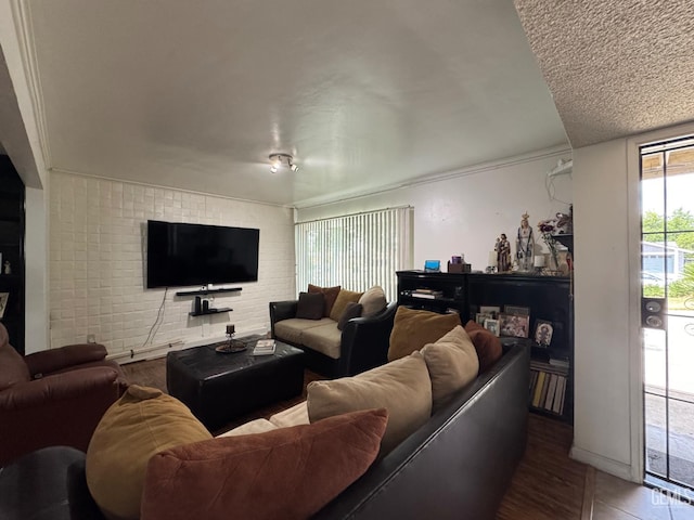 6301 Scenic Way, Bakersfield, CA 93309 - living room featuring brick wall