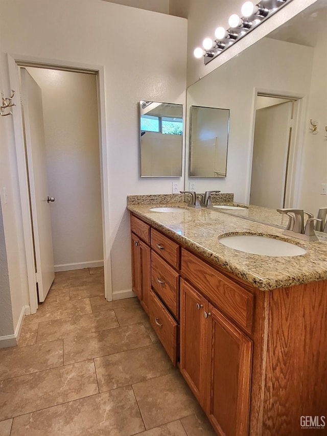 11511 Bay Meadows Ln, Bakersfield, CA 93312 - full bathroom with double vanity and baseboards