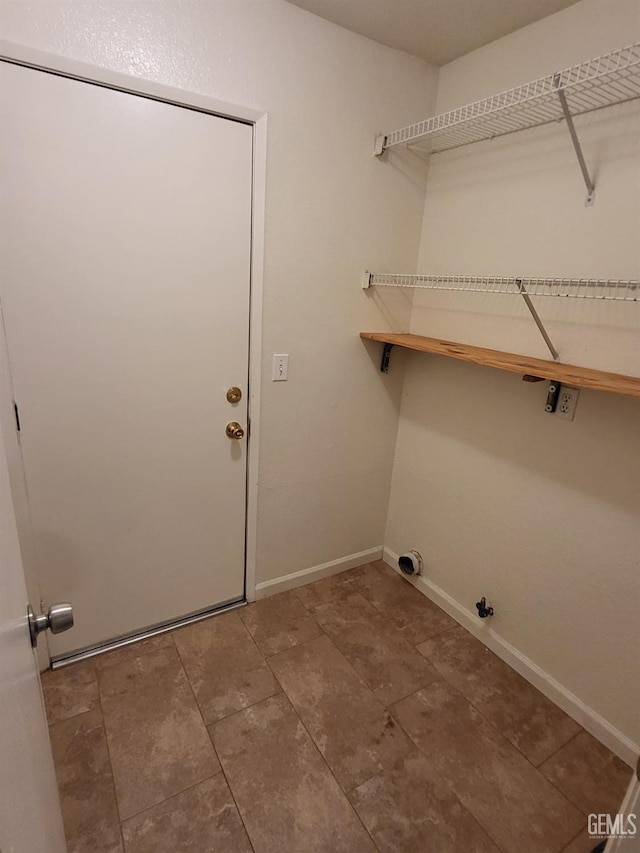 11511 Bay Meadows Ln, Bakersfield, CA 93312 - laundry area with gas dryer hookup and tile patterned flooring