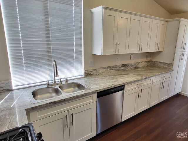11511 Bay Meadows Ln, Bakersfield, CA 93312 - kitchen featuring stainless steel dishwasher, white cabinets, dark wood-style flooring, vaulted ceiling, and gas stove