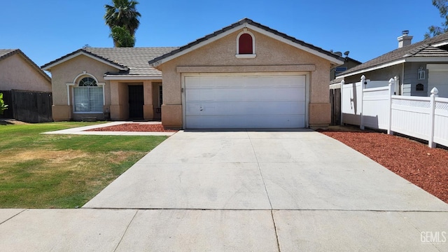 11511 Bay Meadows Ln, Bakersfield, CA 93312 - ranch-style house featuring a tile roof, stucco siding, driveway, and a garage