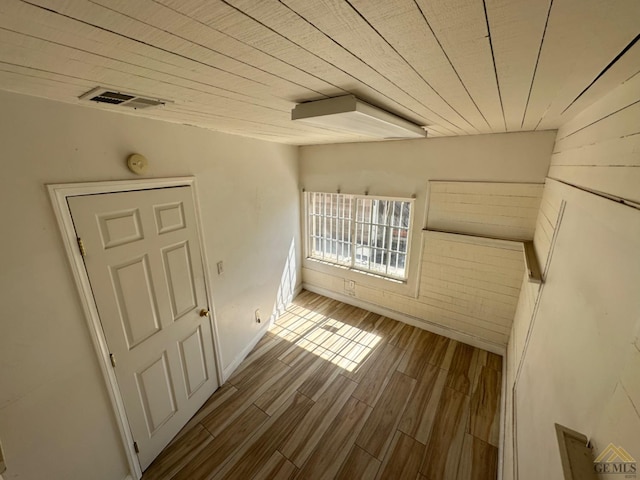 interior space featuring visible vents and wood finished floors