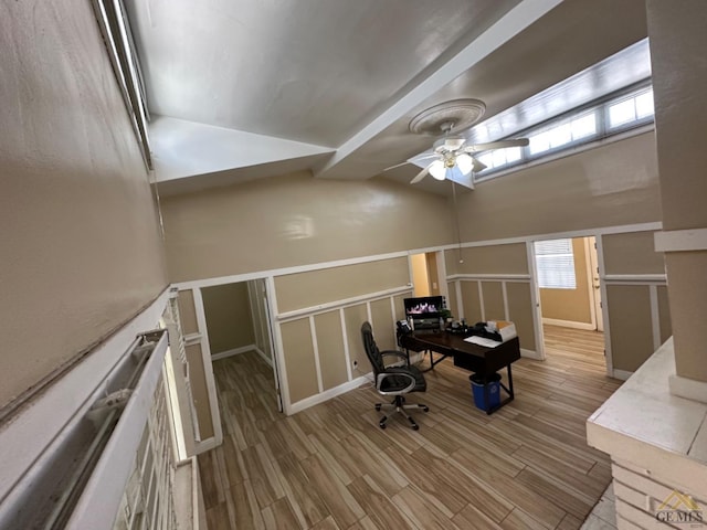 office with ceiling fan and wood finished floors