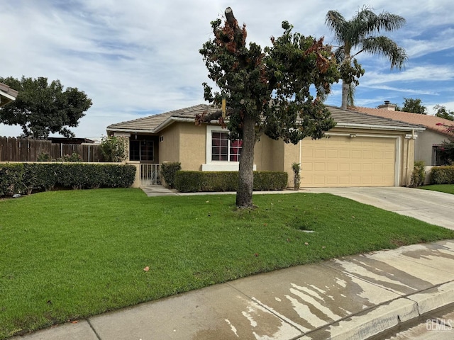 view of front of house with a garage and a front lawn