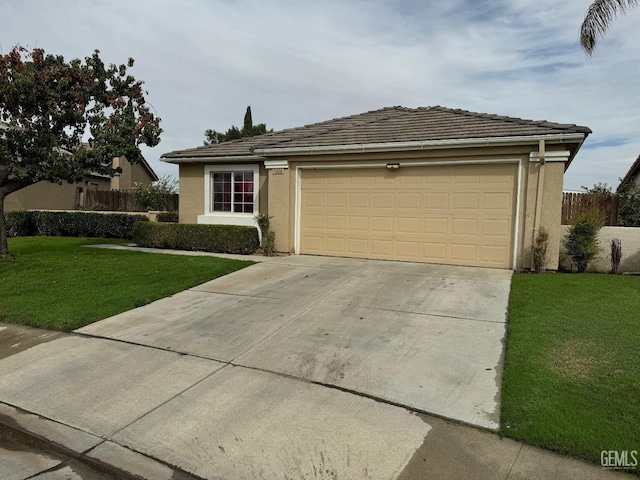 ranch-style home with a front yard and a garage