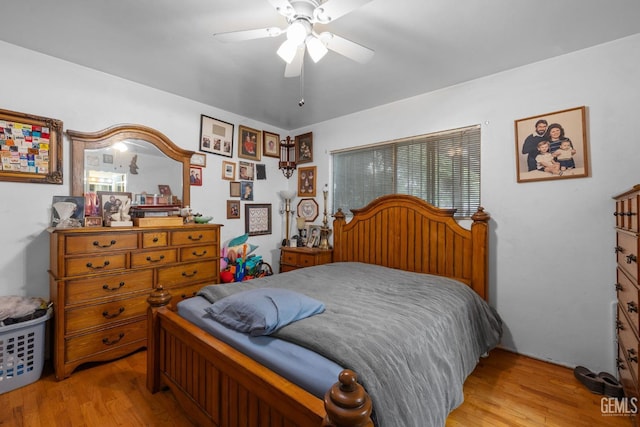 bedroom featuring ceiling fan and wood finished floors