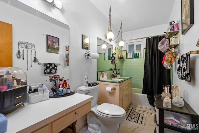 bathroom featuring shower / bathtub combination with curtain, toilet, and vanity