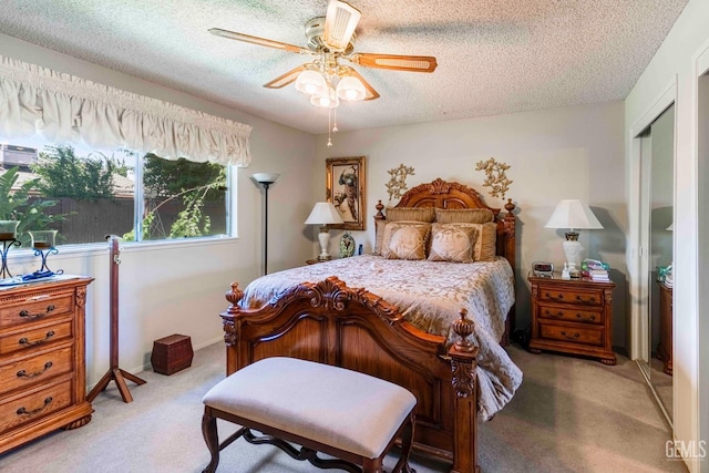 6012 Cumin Ln, Bakersfield, CA 93309 - carpeted bedroom with a textured ceiling, a closet, and ceiling fan