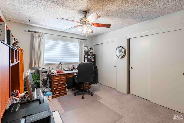 6012 Cumin Ln, Bakersfield, CA 93309 - office area featuring ceiling fan, light colored carpet, and a textured ceiling