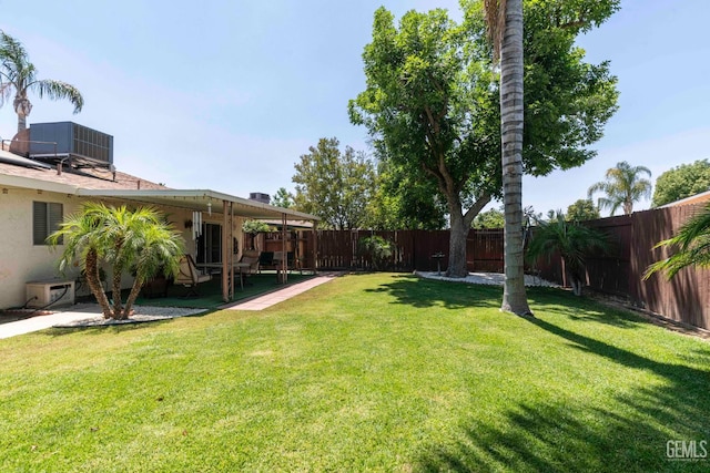 6012 Cumin Ln, Bakersfield, CA 93309 - view of yard featuring cooling unit and a patio area