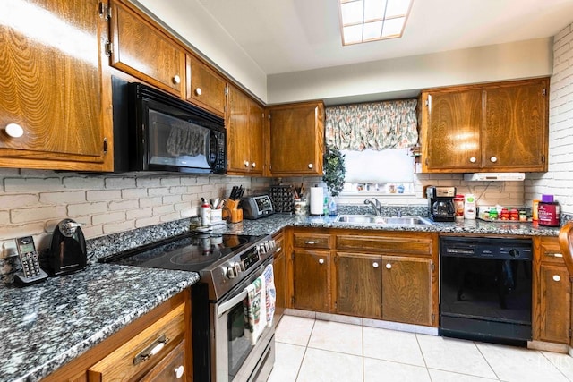 6012 Cumin Ln, Bakersfield, CA 93309 - kitchen with black appliances, a sink, brown cabinetry, and light tile patterned flooring