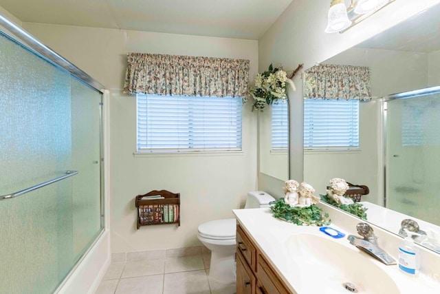6012 Cumin Ln, Bakersfield, CA 93309 - bathroom with vanity, toilet, plenty of natural light, and tile patterned floors