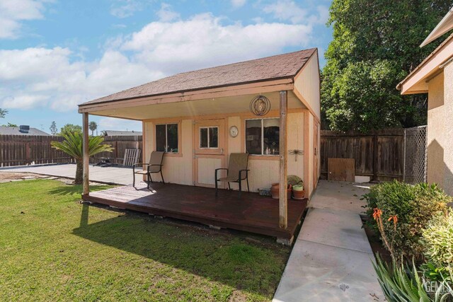 view of outbuilding featuring a fenced backyard