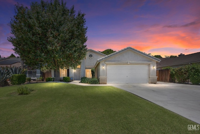 5836 S Greenhorn Mountain Ct, Bakersfield, CA 93313 - ranch-style home featuring a garage, driveway, and stucco siding