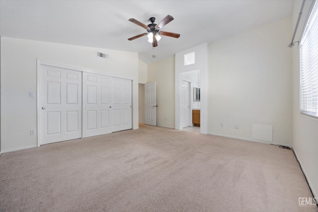 5836 S Greenhorn Mountain Ct, Bakersfield, CA 93313 - unfurnished bedroom featuring carpet floors, multiple windows, a closet, and ensuite bathroom