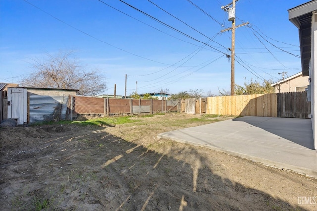 view of yard with a patio area