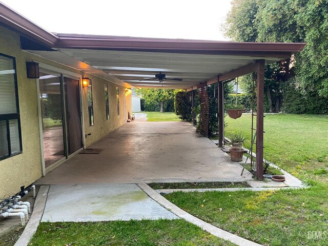 view of yard with ceiling fan