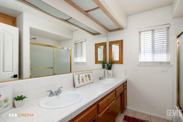13019 Queen Palm Ct, Bakersfield, CA 93314 - full bath featuring a shower with door, double vanity, and tile patterned floors