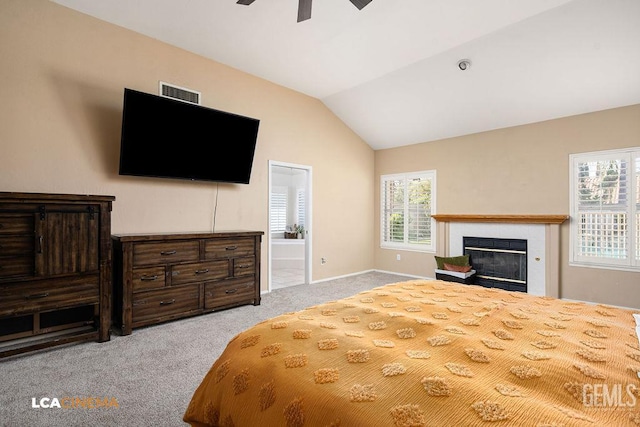 13019 Queen Palm Ct, Bakersfield, CA 93314 - bedroom featuring carpet, a fireplace, vaulted ceiling, connected bathroom, and ceiling fan