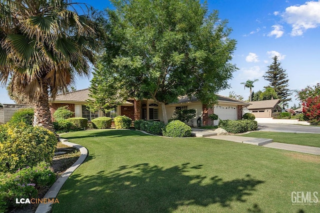 13019 Queen Palm Ct, Bakersfield, CA 93314 - view of front facade with a garage, a front lawn, and concrete driveway
