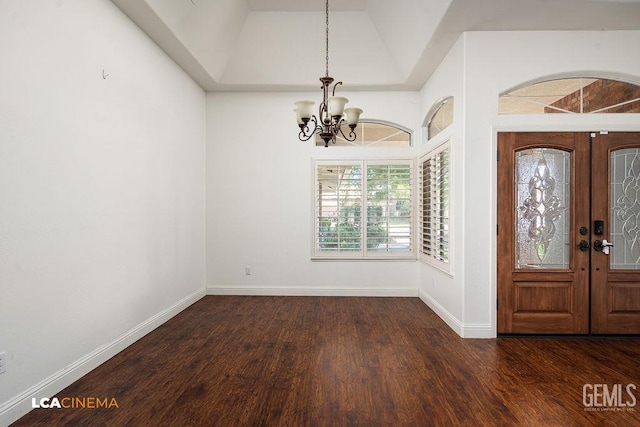 13019 Queen Palm Ct, Bakersfield, CA 93314 - foyer entrance with a chandelier, wood finished floors, french doors, and lofted ceiling