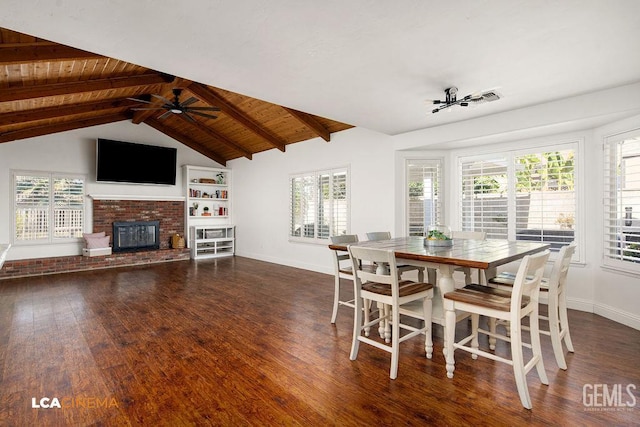 13019 Queen Palm Ct, Bakersfield, CA 93314 - dining room with a ceiling fan, dark wood-style floors, wood ceiling, and a fireplace