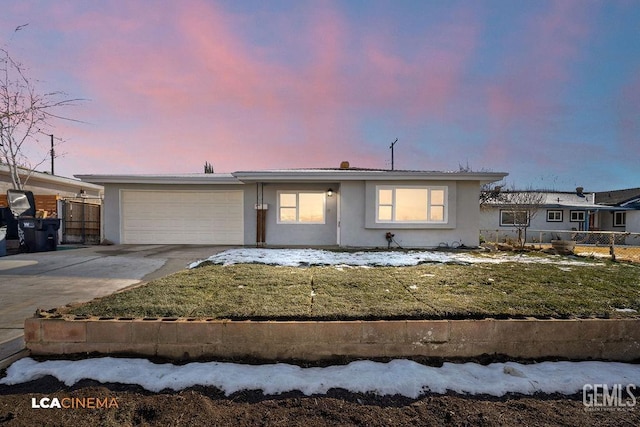 ranch-style home with a garage