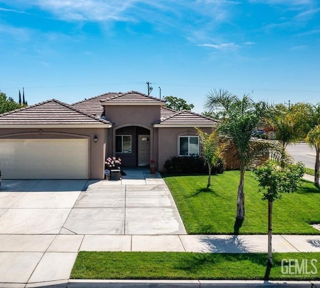 1756 Bautista Ave, Wasco, CA 93280 - view of front facade featuring an attached garage, concrete driveway, stucco siding, and a tiled roof
