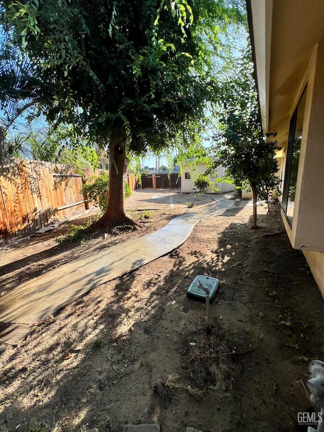 5306 Deville Ct, Bakersfield, CA 93308 - fenced backyard featuring an outdoor structure