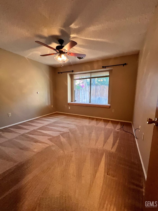 5306 Deville Ct, Bakersfield, CA 93308 - unfurnished room with carpet flooring, a ceiling fan, and a textured ceiling