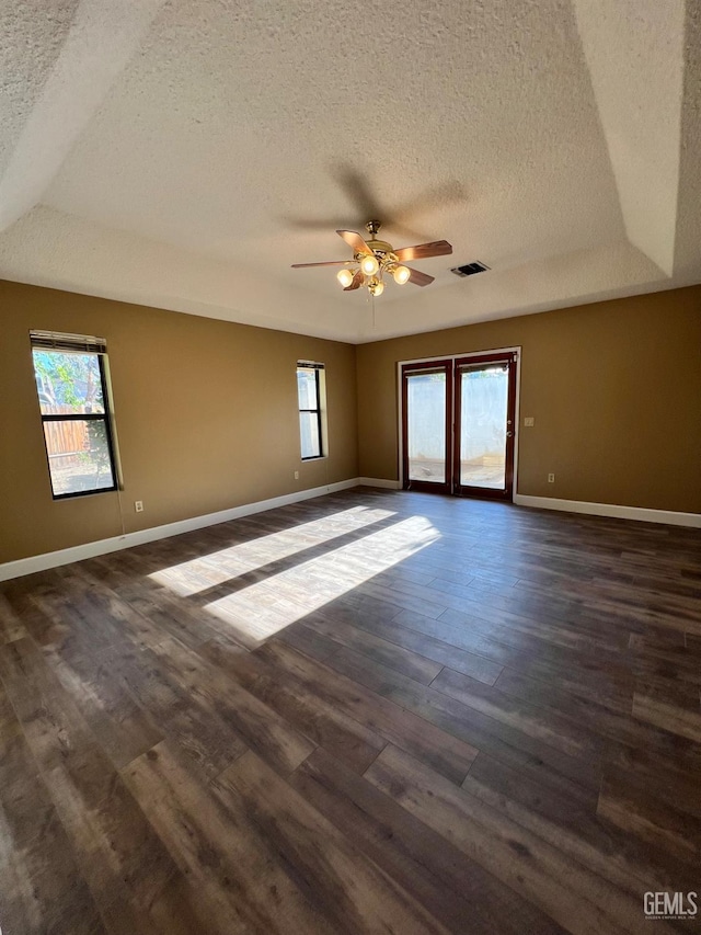 5306 Deville Ct, Bakersfield, CA 93308 - unfurnished room with a textured ceiling, dark wood-style flooring, and ceiling fan
