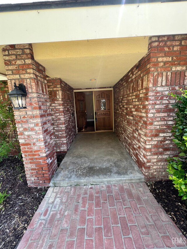5306 Deville Ct, Bakersfield, CA 93308 - entrance to property featuring brick siding