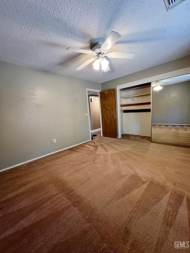 5306 Deville Ct, Bakersfield, CA 93308 - unfurnished bedroom with carpet floors, a closet, a textured ceiling, and a ceiling fan