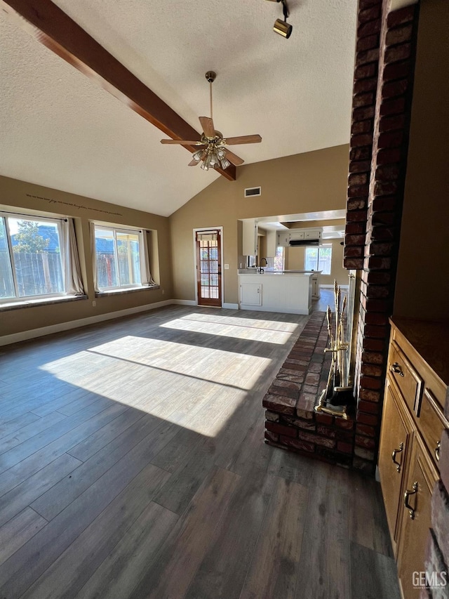5306 Deville Ct, Bakersfield, CA 93308 - unfurnished living room with a textured ceiling, ceiling fan, and dark wood-style flooring