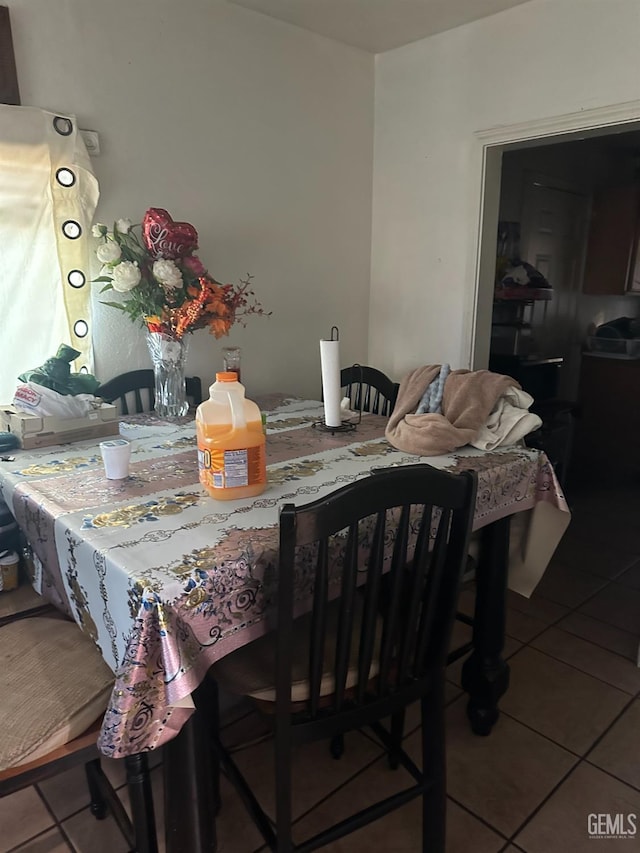 view of tiled dining space