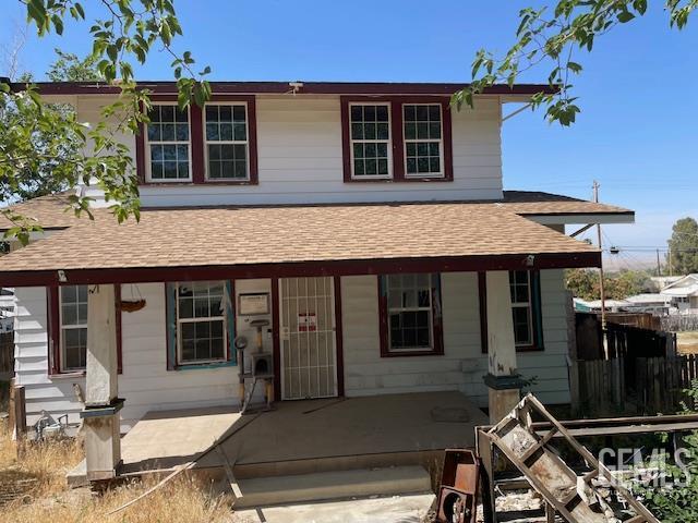 612 D St, Taft, CA 93268 - view of front facade featuring a porch and roof with shingles
