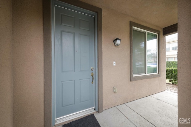 property entrance with a porch