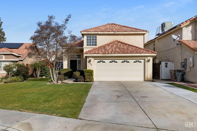 view of front facade featuring a garage and a front lawn