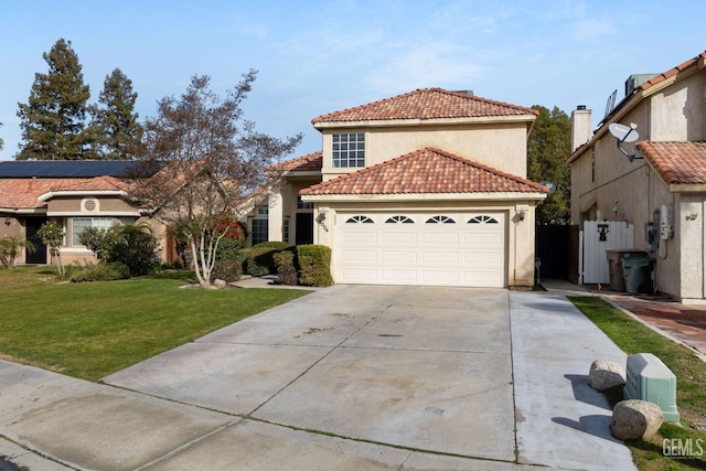 mediterranean / spanish-style house with a garage and a front lawn