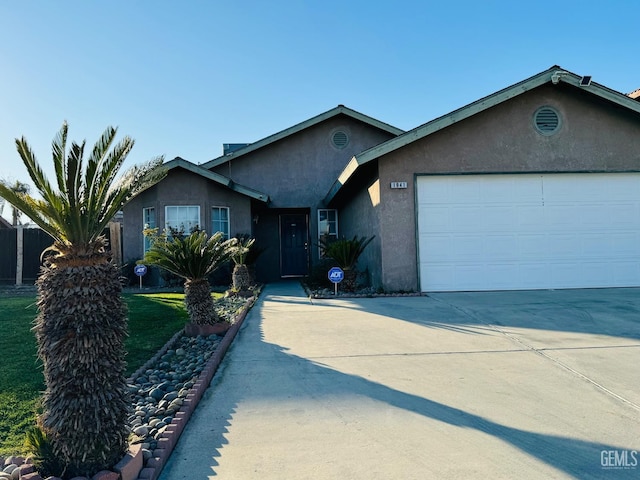 ranch-style home with a garage